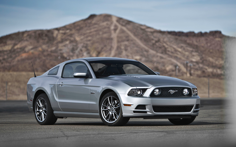 Illustration for article titled Oppositelock Review: '15 WRX STI vs '13 Mustang GT 5.0